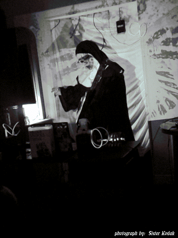 The Malware Ministry live in concert, preforming during Room####. Sister Bliss is depected with her keytar. Photograph by: Sister Kodak